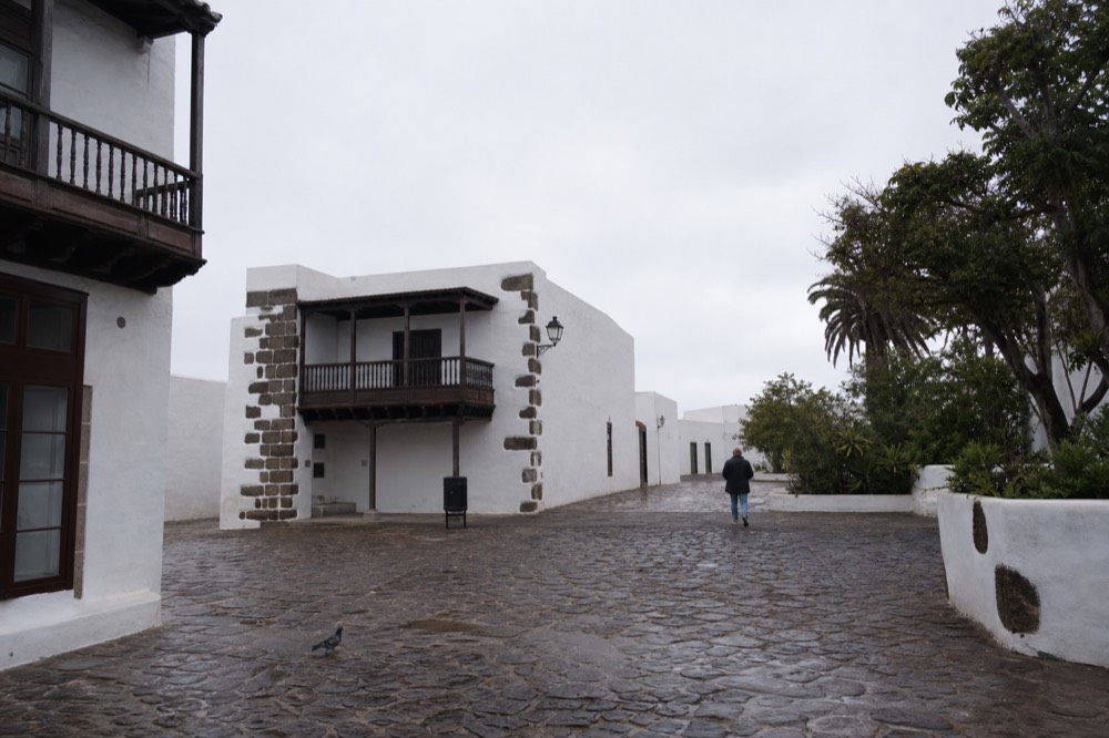 White historic buildings and cobbled square of Teguise old town