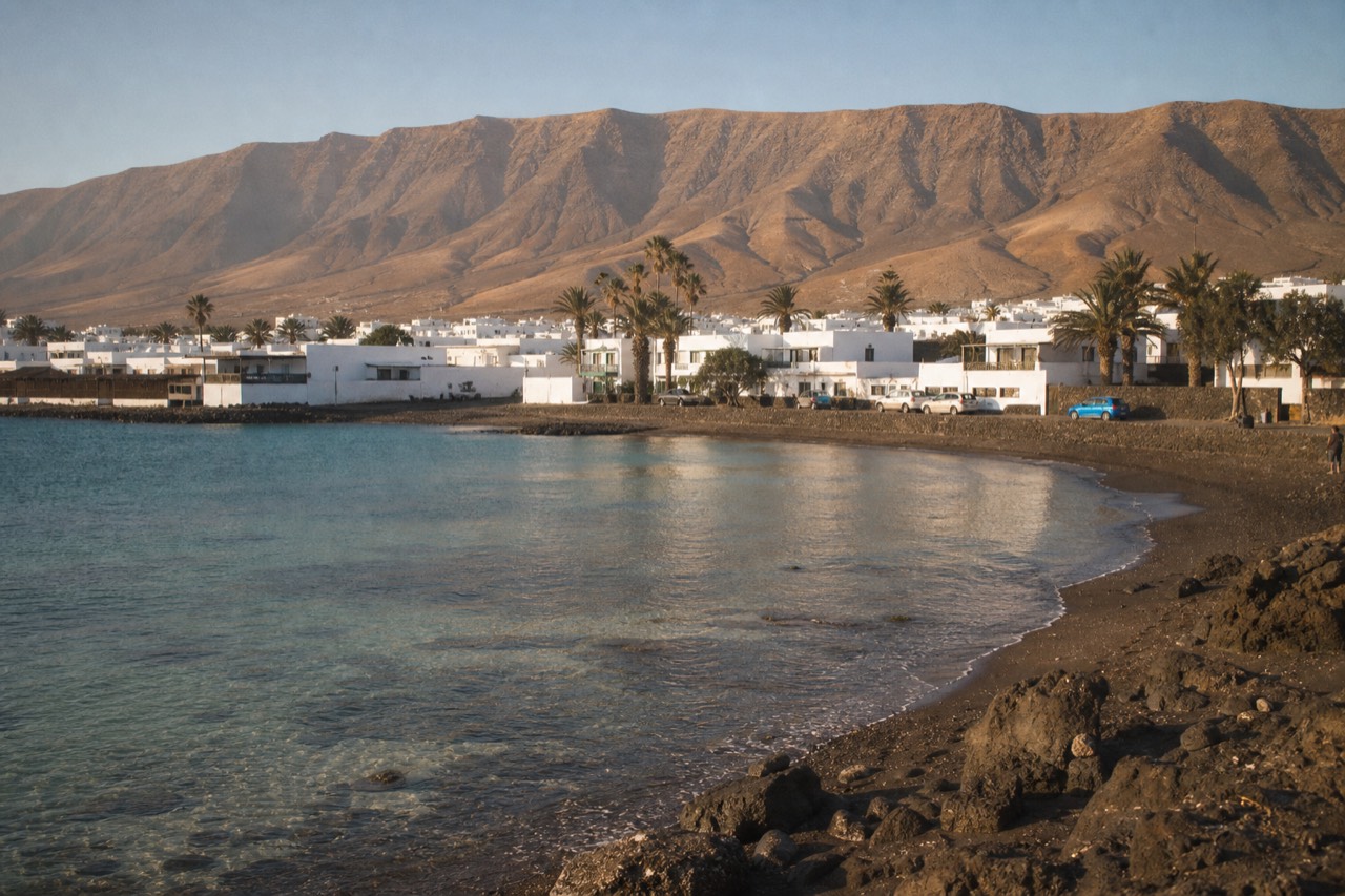 Playa Blanca seafront with the volcanic hills of southern Lanzarote behind