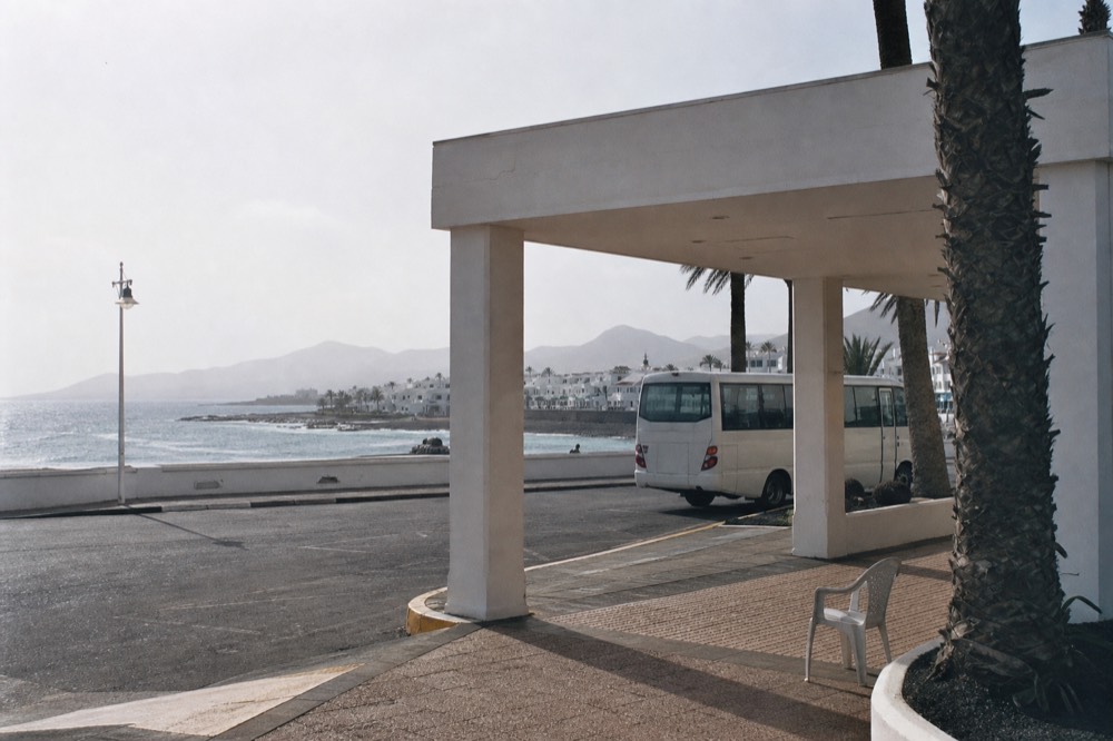 Hotel pickup area along the seafront promenade of Puerto del Carmen